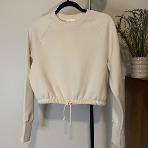H&M oatmeal girls sweatshirt with ruched and tie bottom